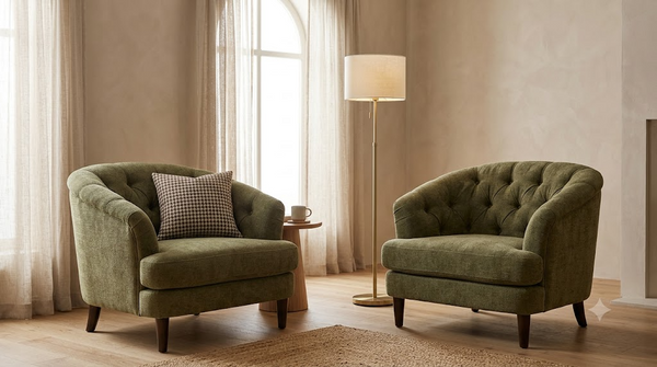 Two olive-green chenille tufted club chairs shown together as a pair